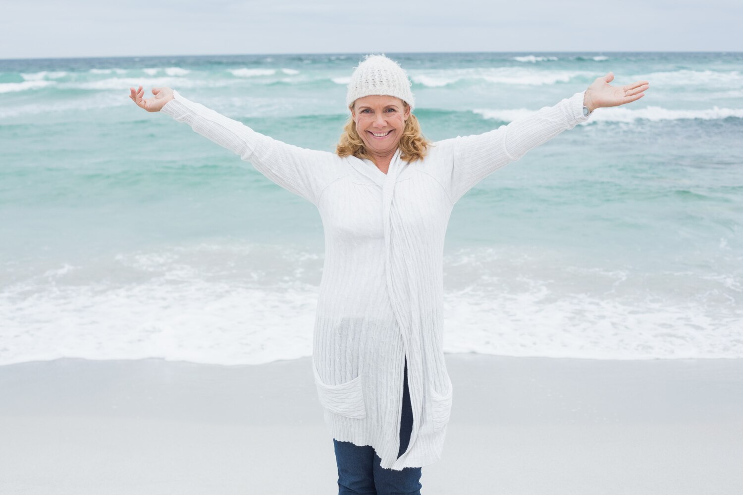 Senior woman with arms outstretched beach 13339 284247 Senior woman with arms outstretched beach 13339 284247