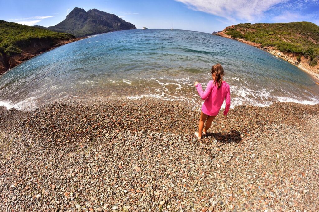 Rear view woman walking sand beach 1048944 6939839 Rear view woman walking sand beach 1048944 6939839